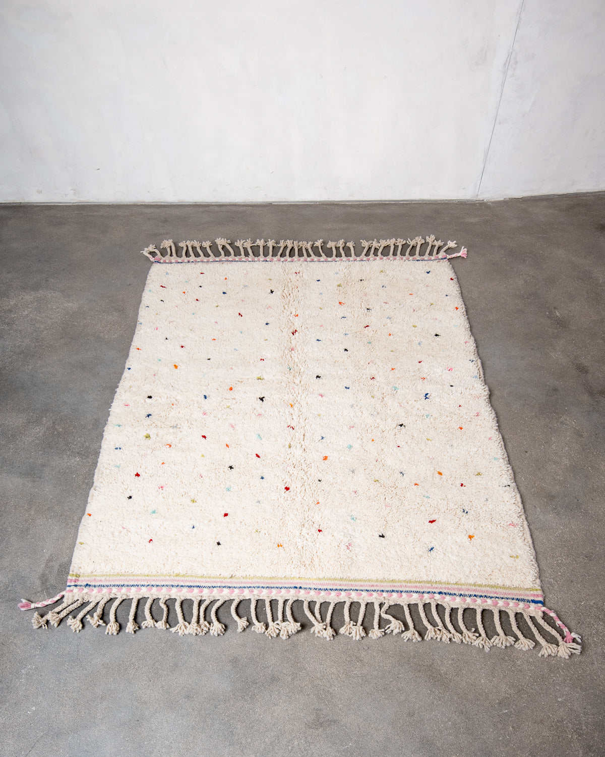 Modern, designer, handcrafted Berber rug from Morocco. Beniourain carpet with beautiful colours and patterns and fluffy wool texture.
